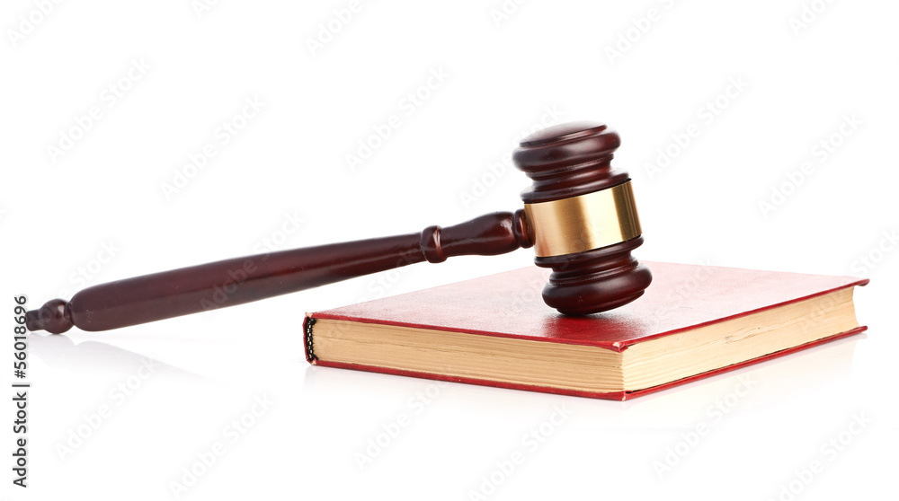 Judge's gavel on red legal book