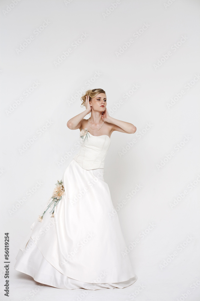 Beautiful blonde bride wearing wedding dress Beautiful blonde bride wearing wedding dress