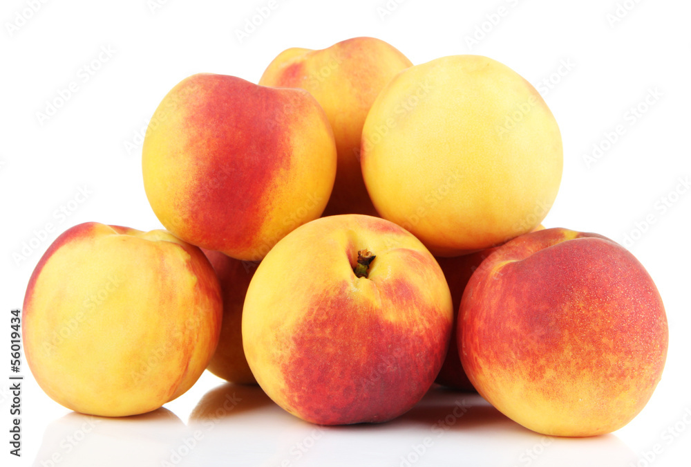 Ripe sweet peaches, isolated on white Ripe sweet peaches, isolated on white