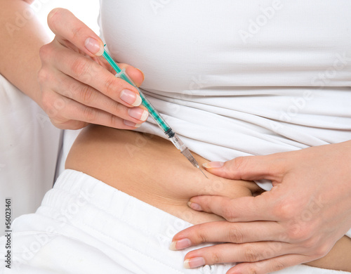 abdomen subcutaneous syringe injection  vaccination
