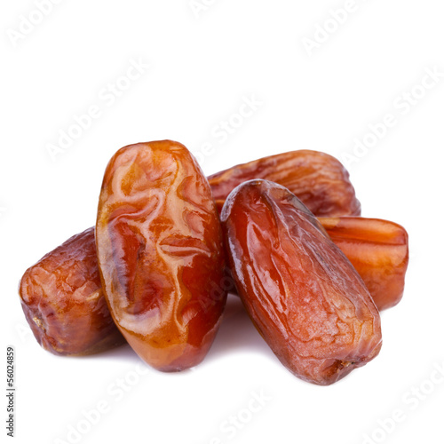 dried dates on white background