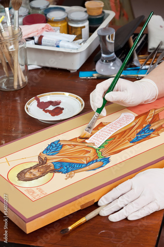   Icon-painter makes new Christian icon with Christ