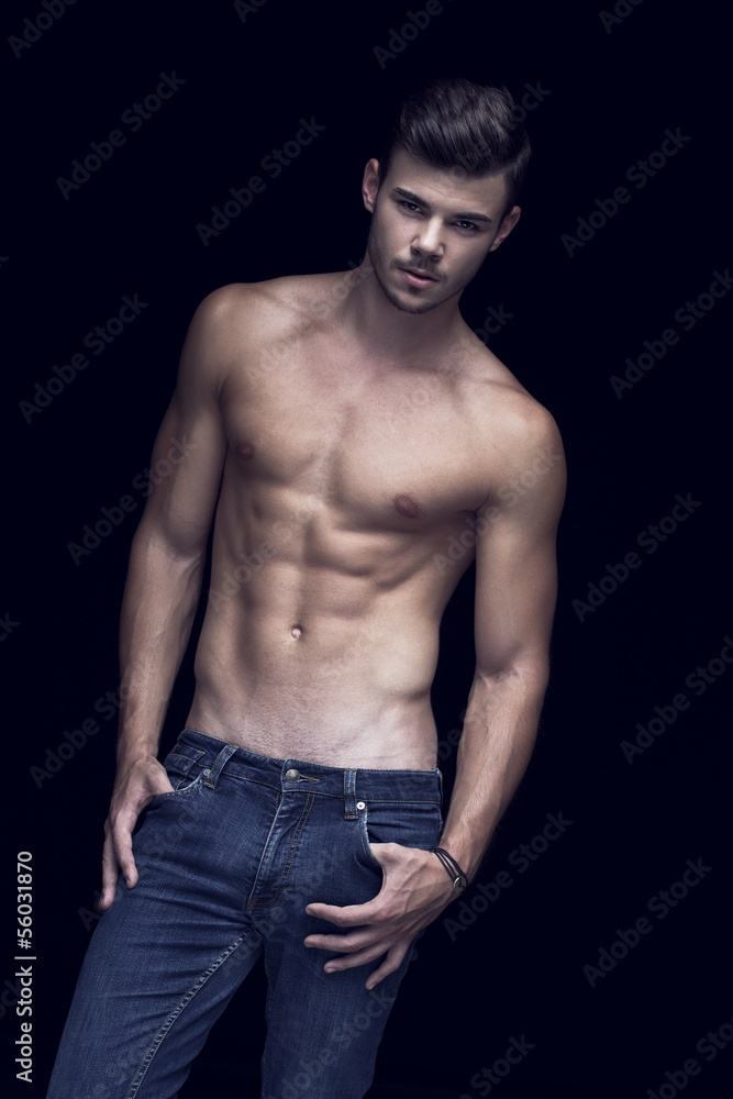 Muscular handsome man in Studio Muscular handsome man in Studio