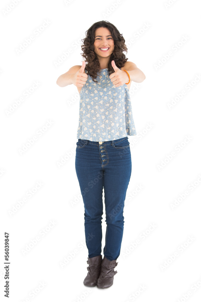 Beautiful brunette posing thumbs up Beautiful brunette posing thumbs up