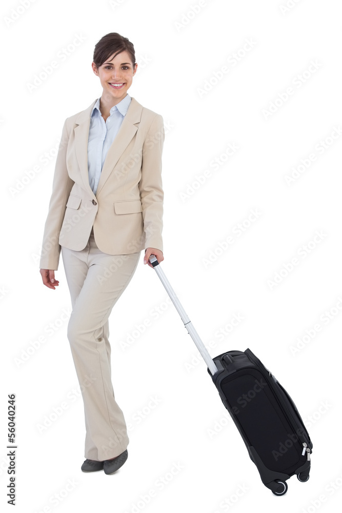 Happy businesswoman posing with suitcase Happy businesswoman posing with suitcase