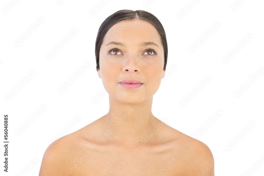 Cheerful woman looking up Cheerful woman looking up
