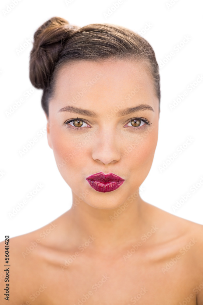 Cheerful woman with red lips giving a kiss Cheerful woman with red lips giving a kiss