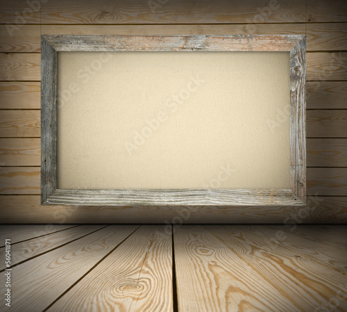 Old board on wooden wall