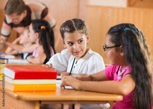 Portrait of happy pupil at lesson