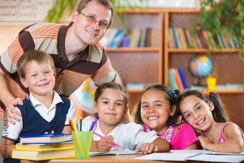 Group of pupils in classroom with teacher