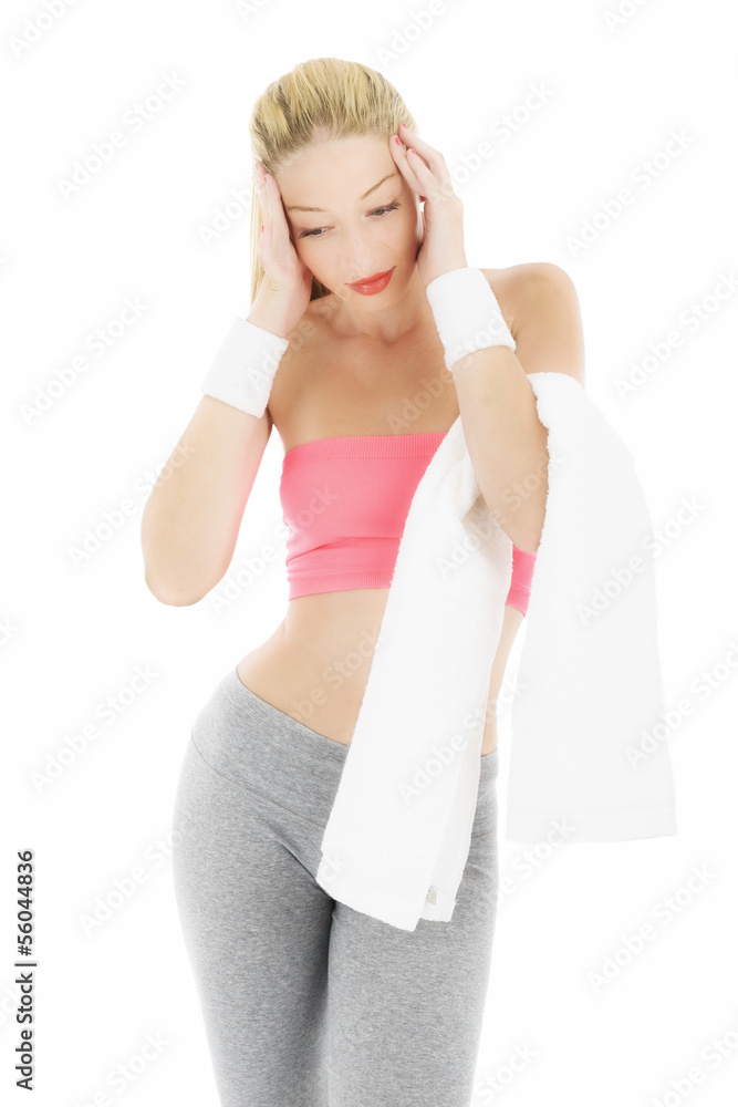 Beautiful young blonde woman taking a break from working