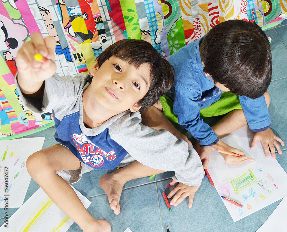 Fototapeta premium Sibling boys drawing and coloring