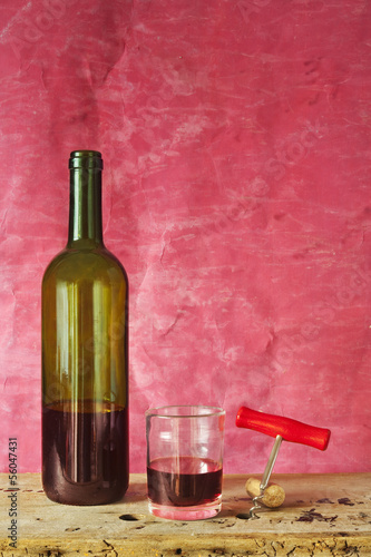 Bottle of wine, glass ,cork, corkscrew, free copy space