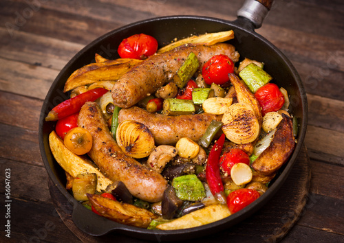 Sausages and vegetables in the pan
