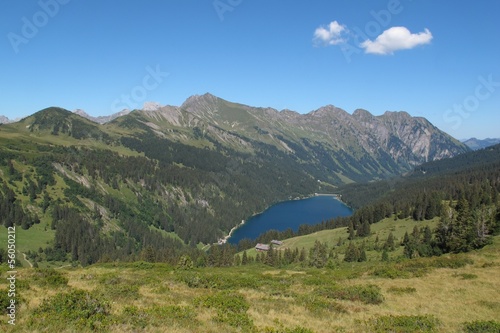 Idyllic landscape in the Swiss Alps, mountains and lake Arnensee