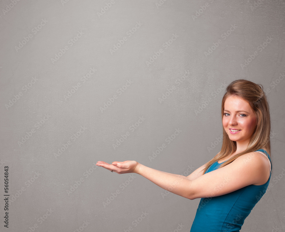 Pretty woman presenting an empty copy space Pretty woman presenting an empty copy space