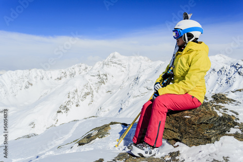 Ski - female skier enjoying panoramic view