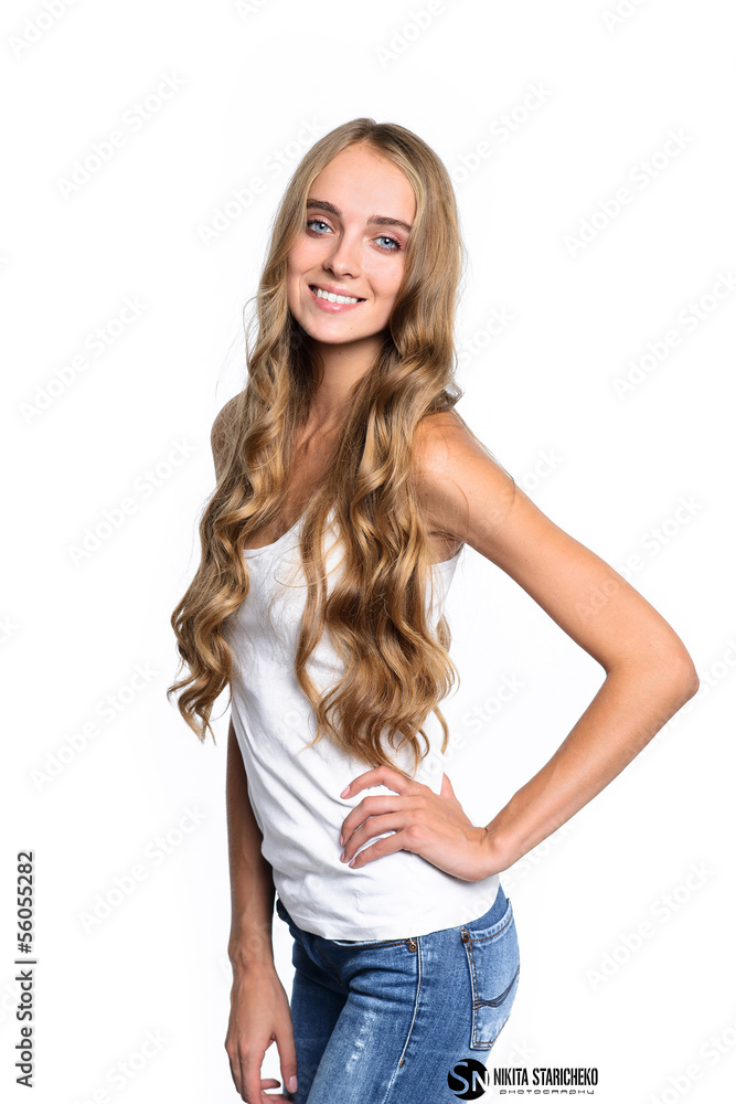 Portrait of young beautiful smiling woman with long hair. Portrait of young beautiful smiling woman with long hair.