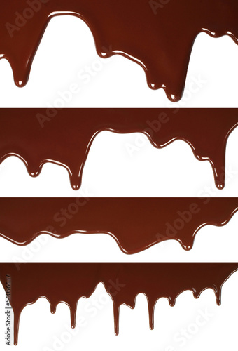 Melted chocolate dripping set on white background .