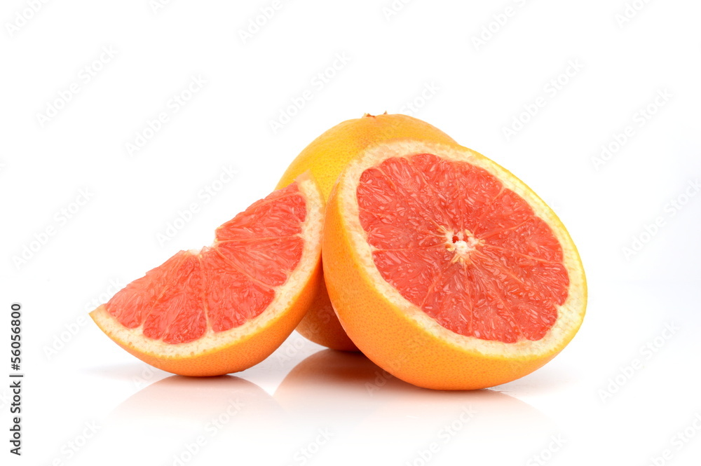 Studio shot of three juicy grapefruits isolated on white Studio shot of three juicy grapefruits isolated on white