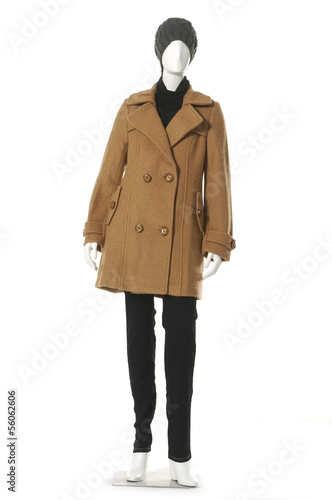 female clothing in hat and coat on mannequin
