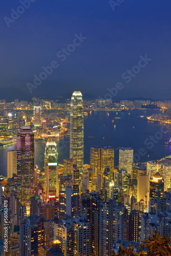 Hong Kong city skyline panorama at night with Victoria Harbor an