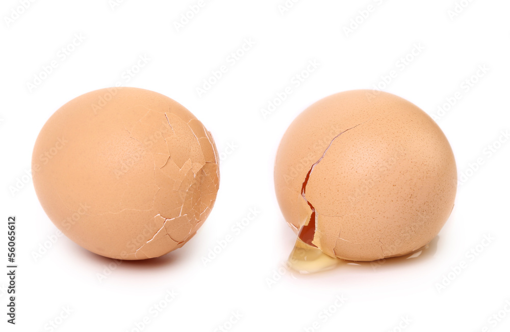 Two broken eggs isolated on white background Two broken eggs isolated on white background