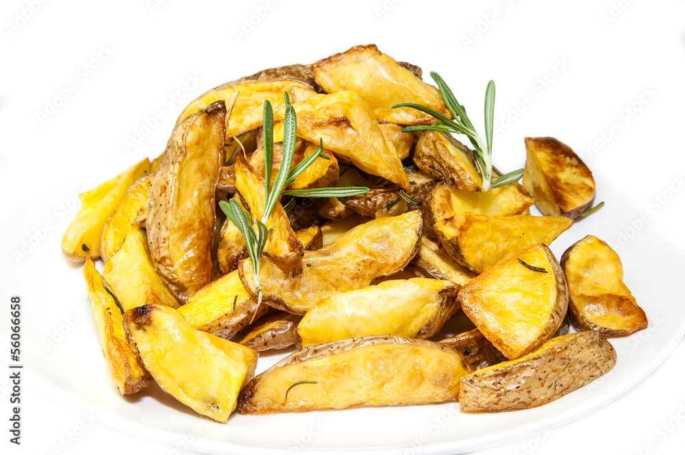 fried potatoes on a baking sheet with herbs and spices fried potatoes on a baking sheet with herbs and spices
