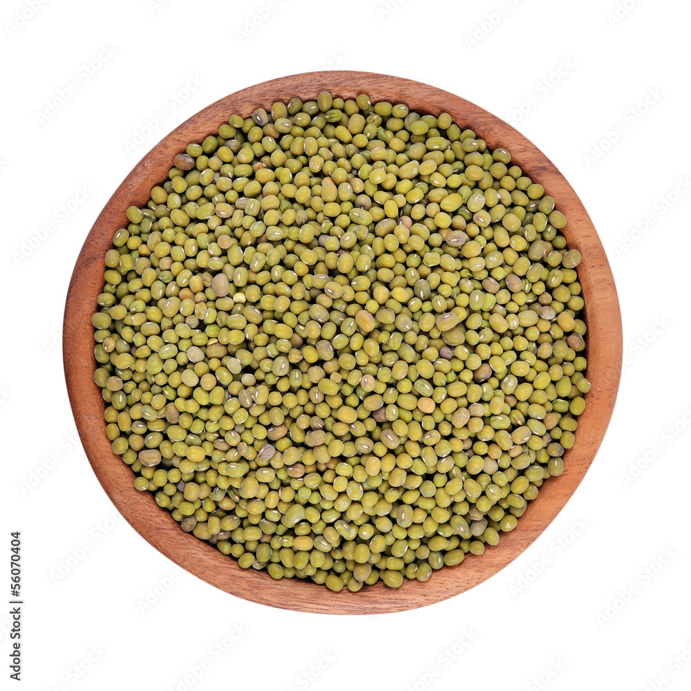 Green mung beans in a wooden bowl on a white background Green mung beans in a wooden bowl on a white background