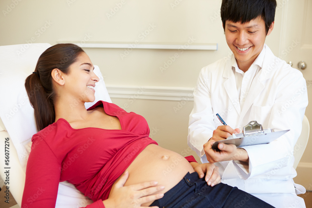 Pregnant Woman Being Given Ante Natal Check By Doctor Pregnant Woman Being Given Ante Natal Check By Doctor