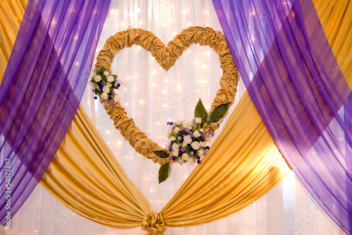 Wedding decor of the satin tapes and flowers
