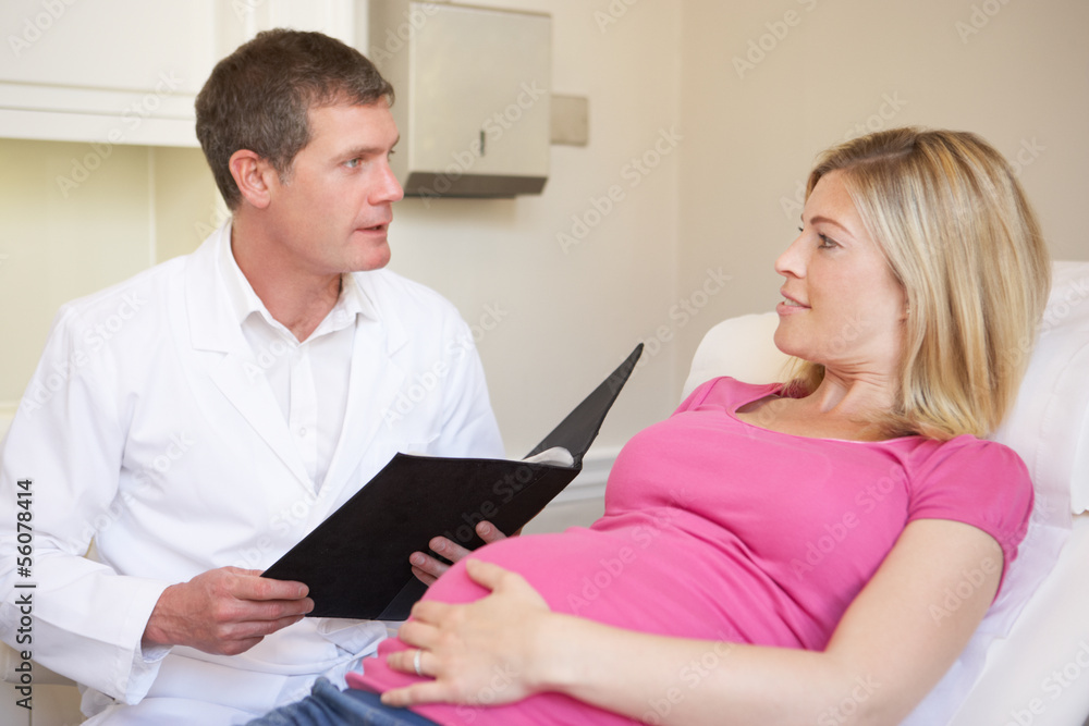 Pregnant Woman Being Given Ante Natal Check By Doctor Pregnant Woman Being Given Ante Natal Check By Doctor