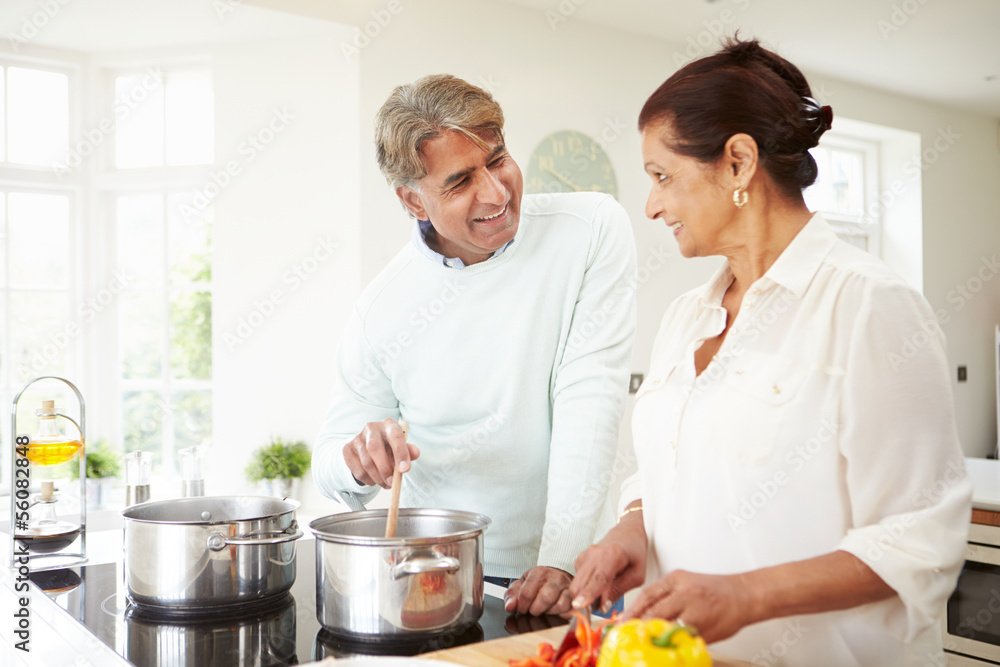 Senior Indian Couple Cooking Meal At Home Senior Indian Couple Cooking Meal At Home