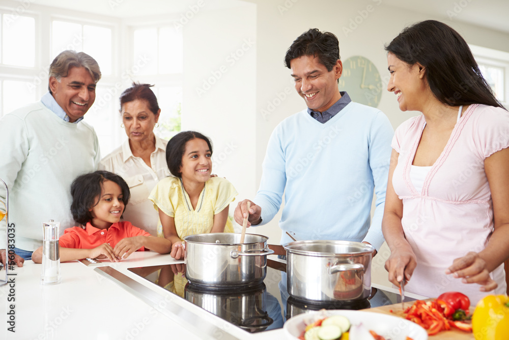 Multi Generation Indian Family Cooking Meal At Home Multi Generation Indian Family Cooking Meal At Home