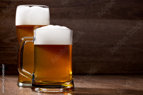 Two glass beer on wooden table