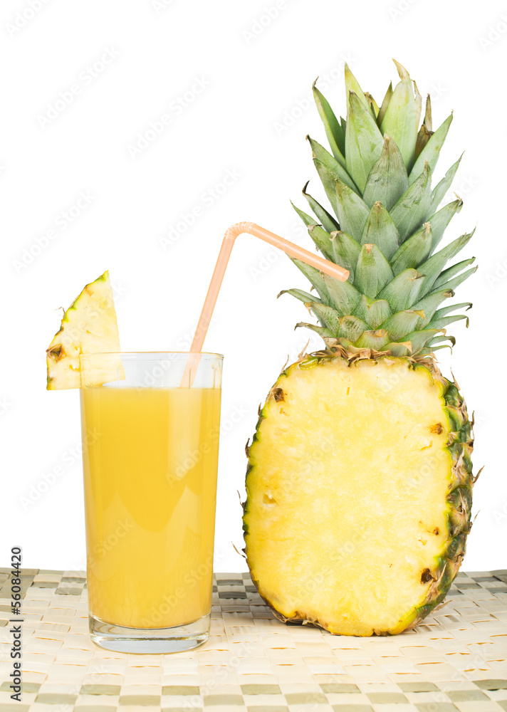 Pineapple and glass of juice Pineapple and glass of juice