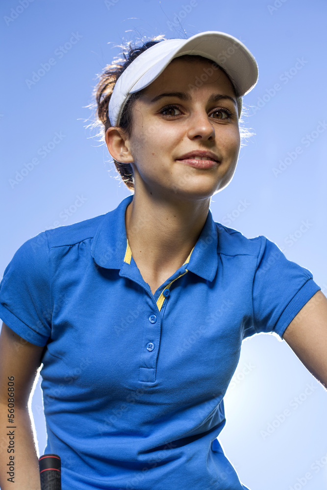 Portrait of a woman playing golf Portrait of a woman playing golf