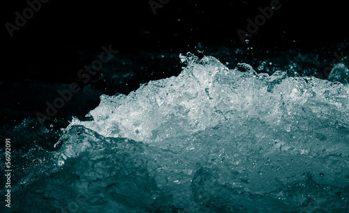 rough water on a black background