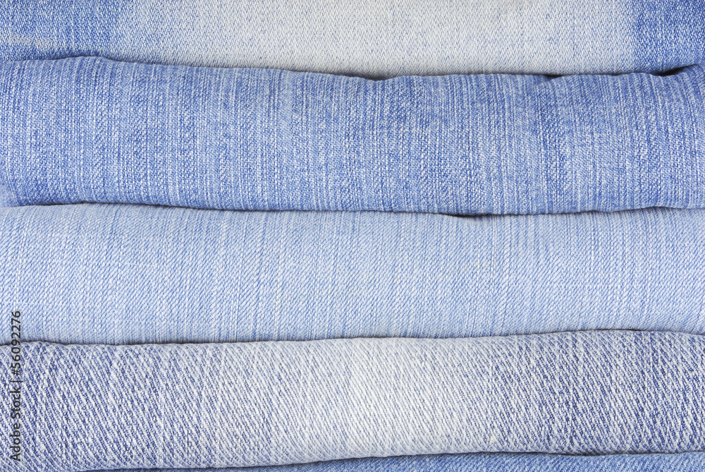 stack of various jeans
