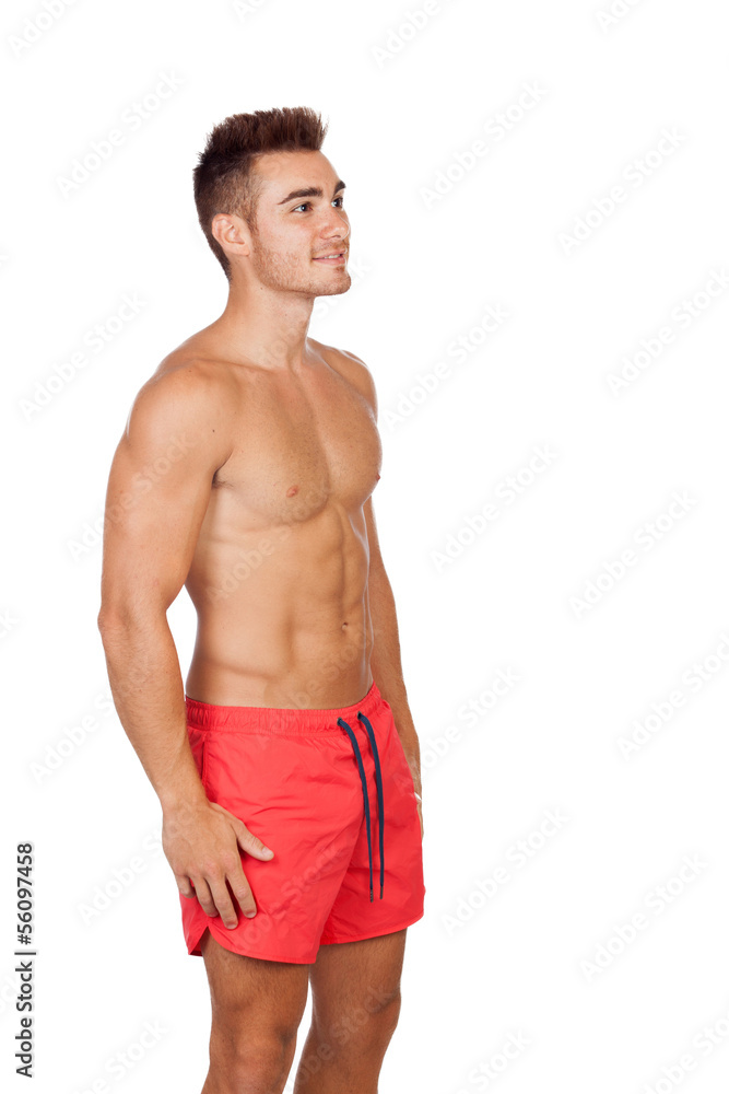 Handsome lifeguard with red swimsuit