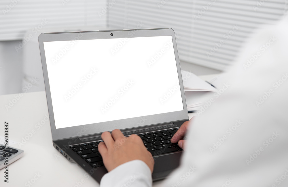 Fototapeta premium office desk and laptop computer with blank screen