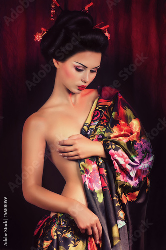 Portrait of a Japanese geisha woman photo