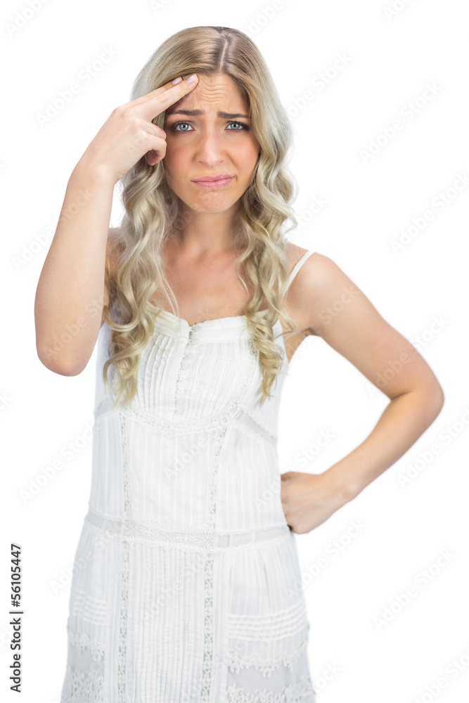 Thinking blonde having interrogative posture Thinking blonde having interrogative posture