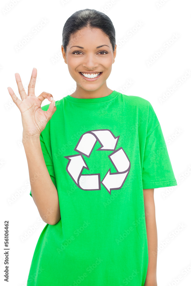 Happy model wearing recycling tshirt making okay gesture Happy model wearing recycling tshirt making okay gesture