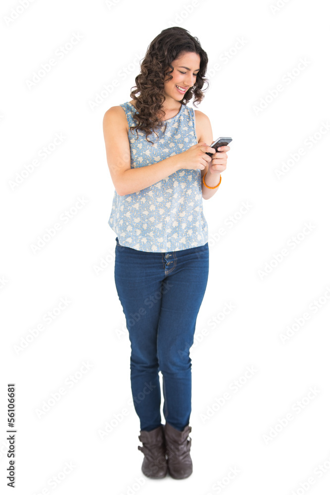 Attractive brunette texting