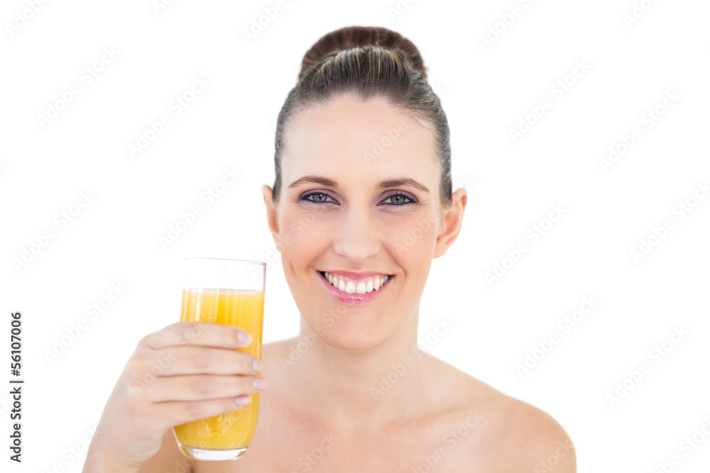 Woman holding glass of orange juice Woman holding glass of orange juice
