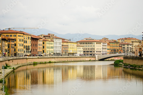 View of Pisa city center building with Arno river