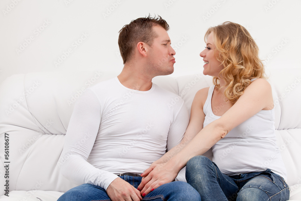 Couple sitting on couch Couple sitting on couch