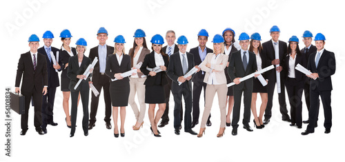 Group Of Architects With Blue Print