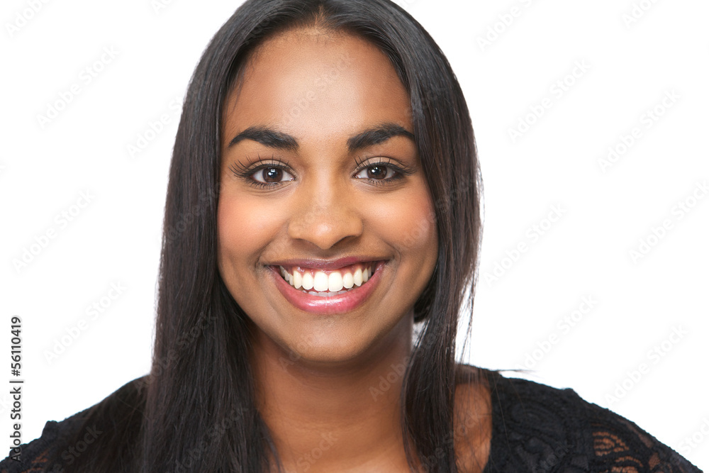 Cheerful young woman smiling on isolated white background Cheerful young woman smiling on isolated white background